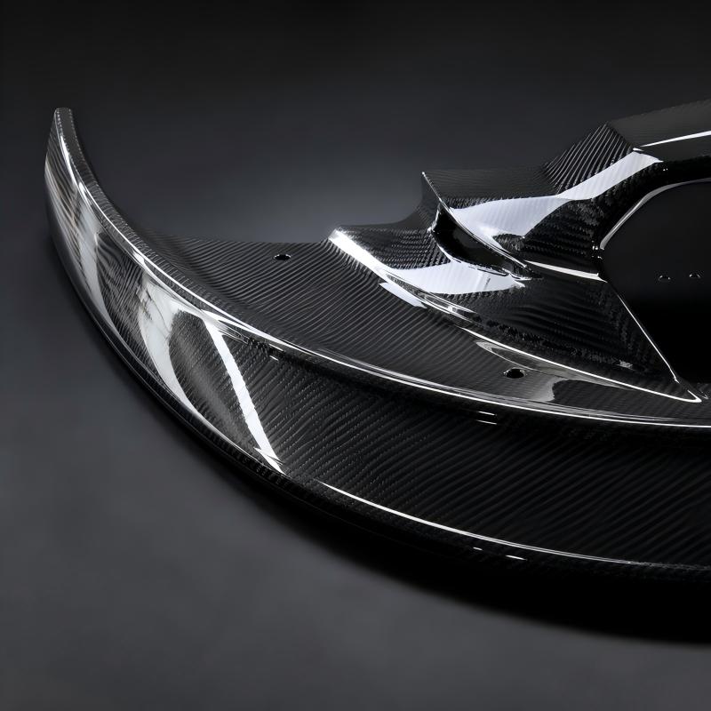 Gloss black carbon fiber front lip with high-gloss clear coat