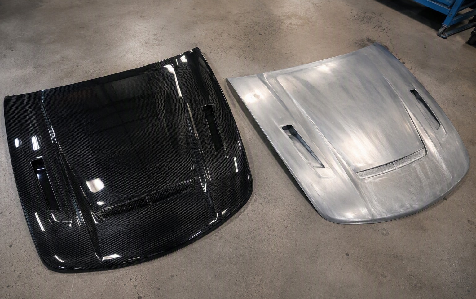 Split comparison of carbon fiber hood and aluminum hood showing weight difference