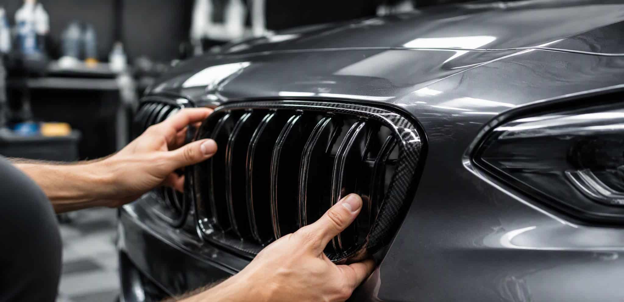 Pressing a carbon fiber grille into the factory bumper clips