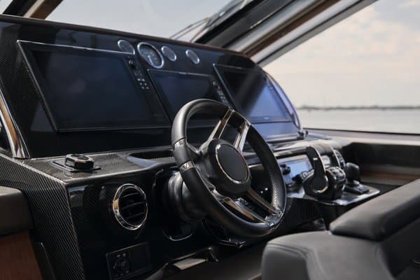 Carbon fiber dashboard panels in a luxury yacht helm