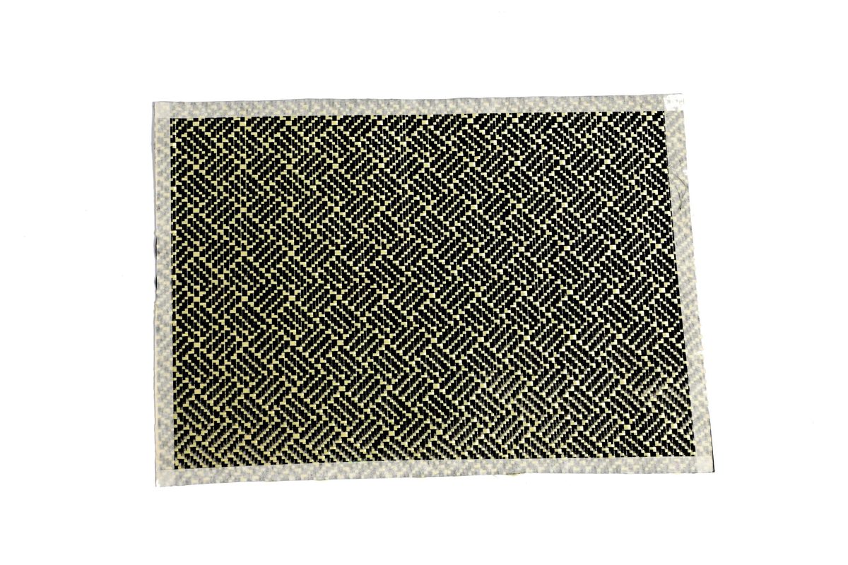 Carbon aramid hybrid fabric in herringbone pattern
