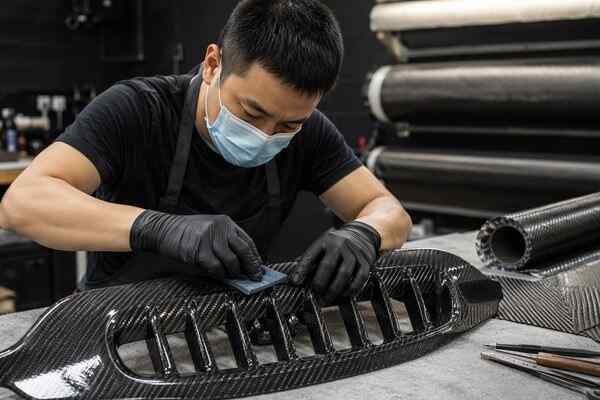 Custom carbon fiber grille built on an existing factory mold