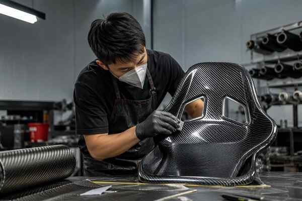 Custom carbon fiber seat built on an existing factory mold